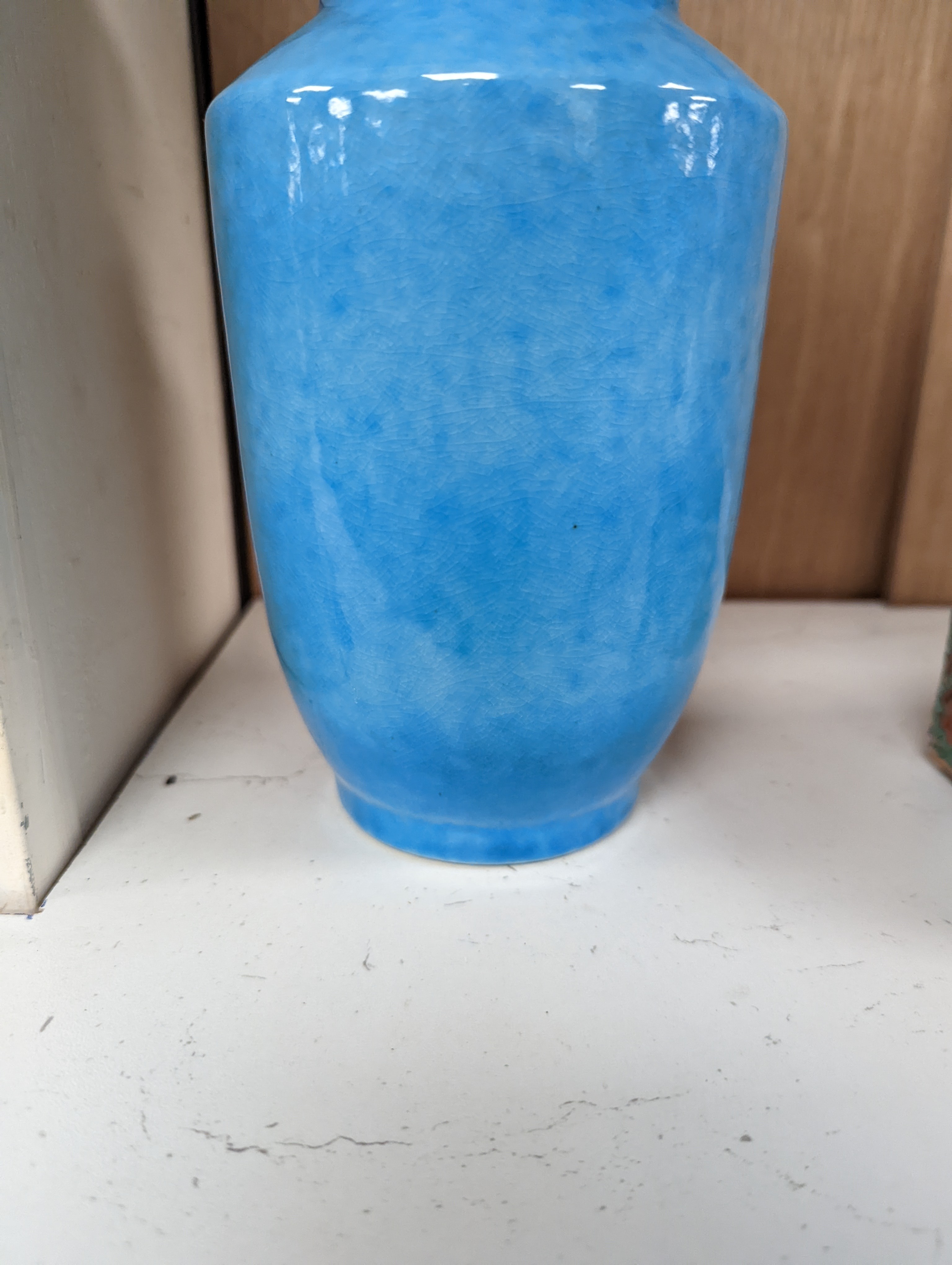 A Chinese turquoise glazed vase 22cm, with a fine crackle to the exterior glaze